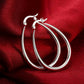 Silver Smooth Oval Hoop Earrings — Front view