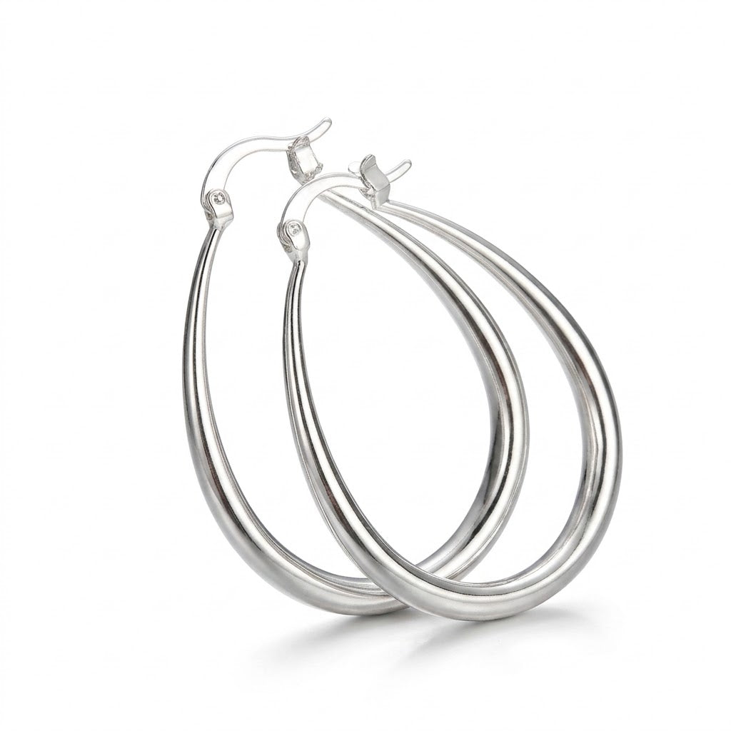 Silver Smooth Oval Hoop Earrings — Three-quarter angle view