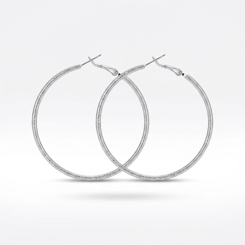 Silver Diamond-Cut Textured Hoop Earrings — Front view