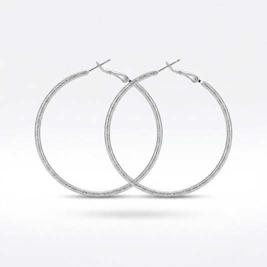 Silver Diamond-Cut Textured Hoop Earrings — Front view