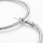 Silver Diamond-Cut Textured Hoop Earrings — Close-up detail