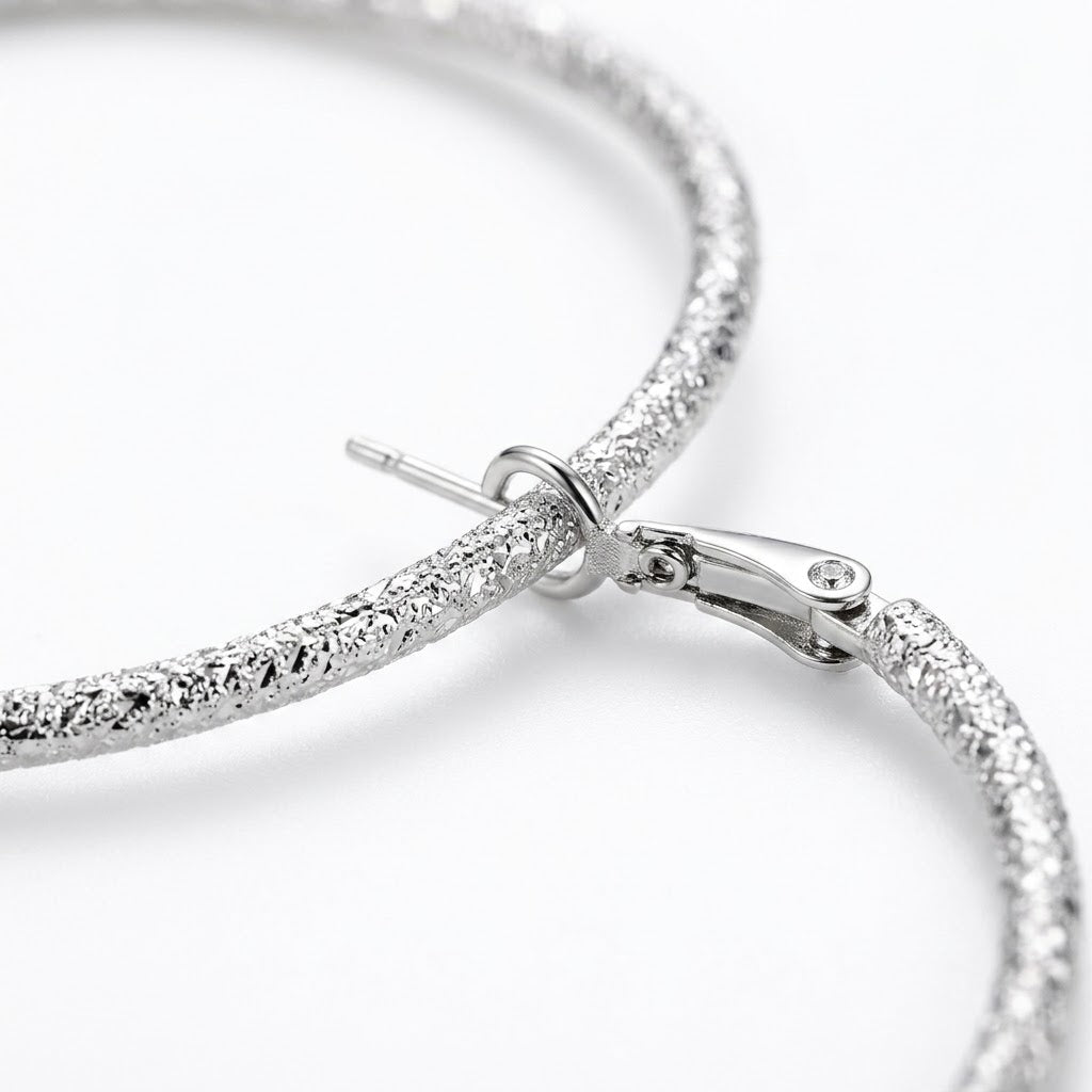 Silver Diamond-Cut Textured Hoop Earrings — Close-up detail