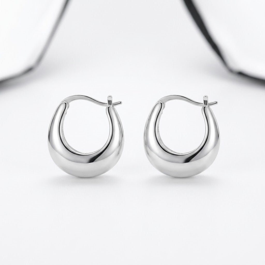 Silver Chunky Huggie Hoop Earrings — Front view