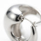Silver Chunky Huggie Hoop Earrings — Close-up detail