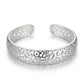Silver Filigree Scrollwork Open Cuff Bangle — Front view