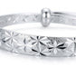 Silver Diamond-Cut Star Burst Adjustable Bangle — Close-up detail