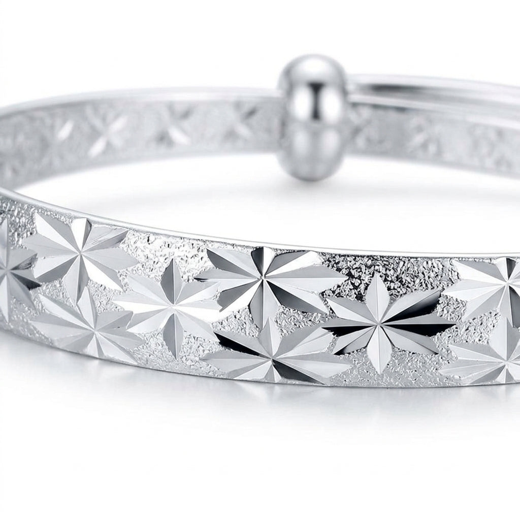 Silver Diamond-Cut Star Burst Adjustable Bangle — Close-up detail