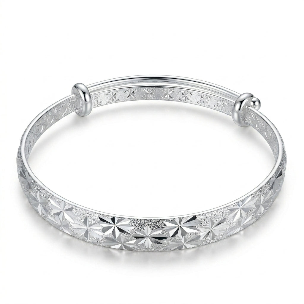 Silver Diamond-Cut Star Burst Adjustable Bangle — Front view