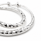 Silver Diamond-Cut Teardrop Hoop Earrings — Close-up detail