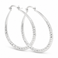 Silver Diamond-Cut Teardrop Hoop Earrings — Three-quarter angle view