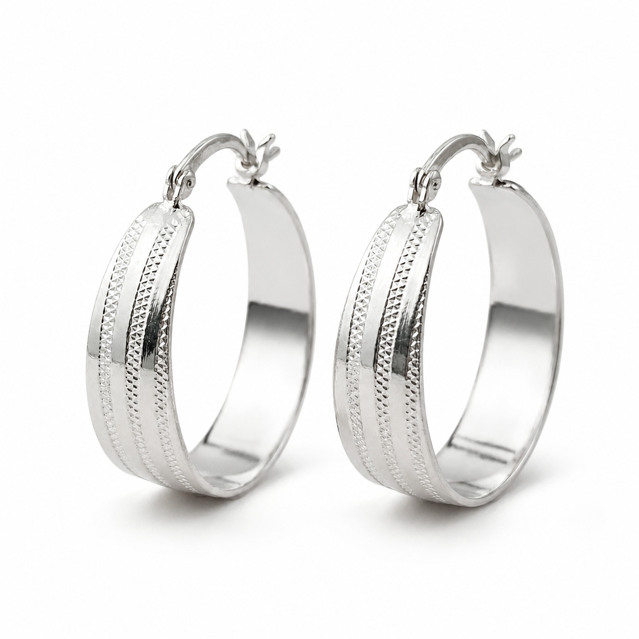 Silver Wide Band Textured Hoop Earrings — Three-quarter angle view