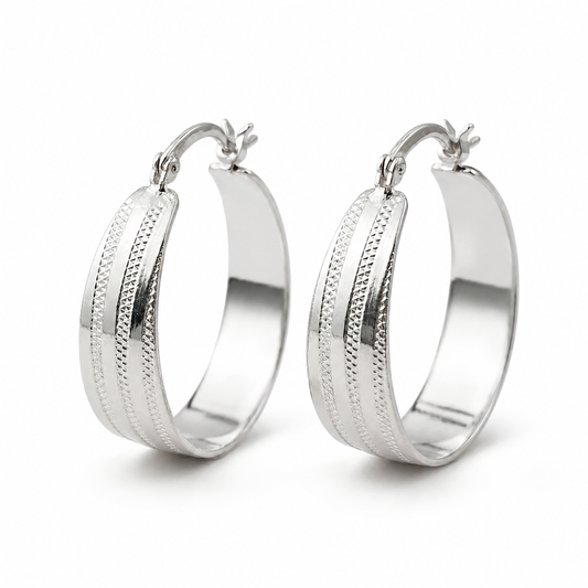 Silver Wide Band Textured Hoop Earrings — Three-quarter angle view