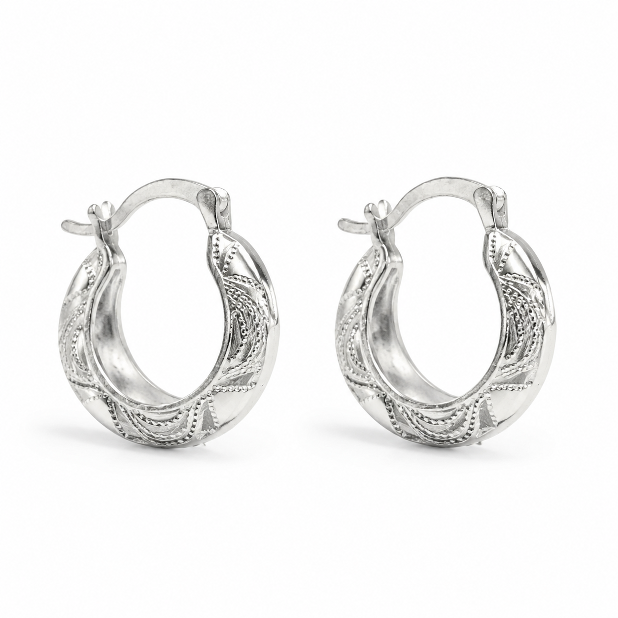 Silver Tribal Engraved Medium Hoop Earrings — Three-quarter angle view