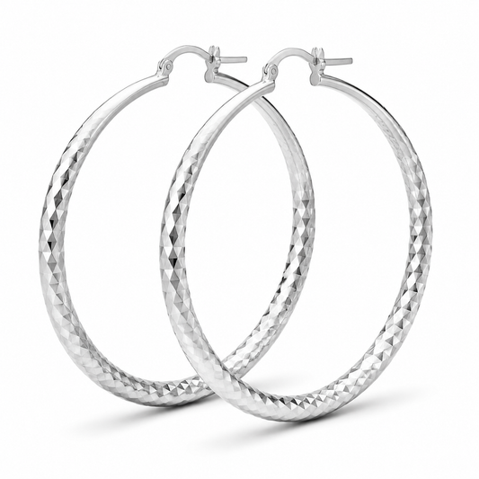 Silver Large Diamond-Cut Hoop Earrings — Three-quarter angle view