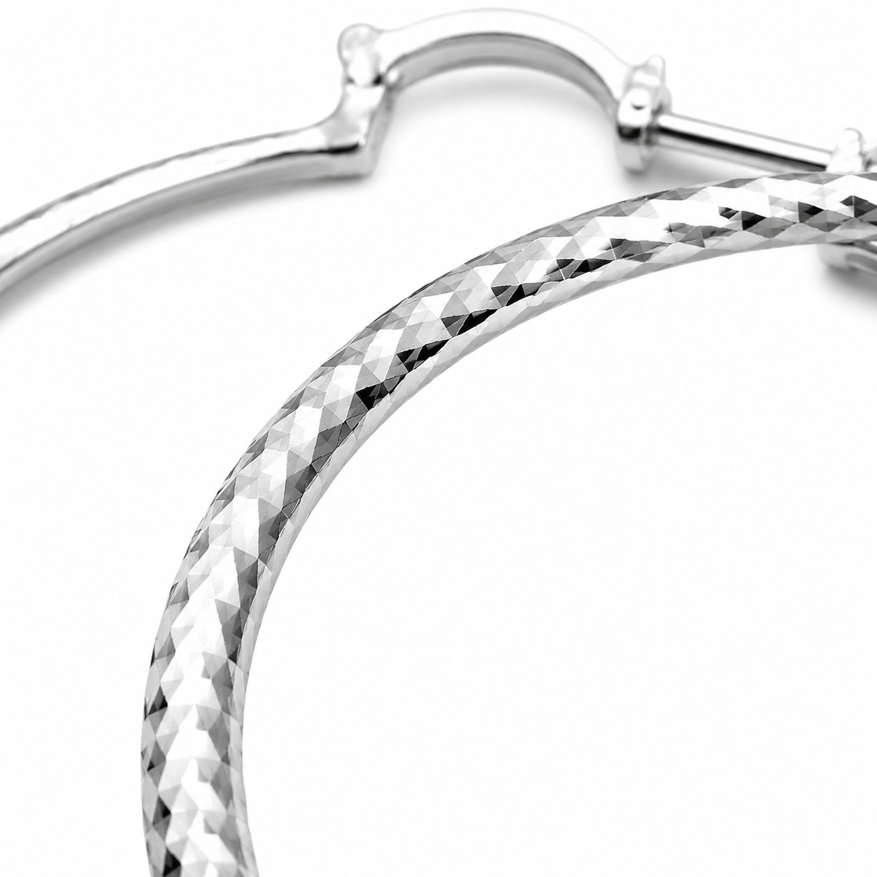 Silver Large Diamond-Cut Hoop Earrings — Close-up detail