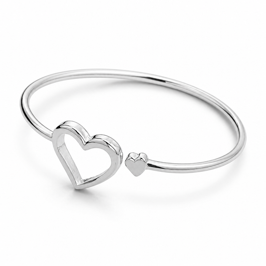 Silver Heart Clasp Minimalist Bangle — Three-quarter angle view