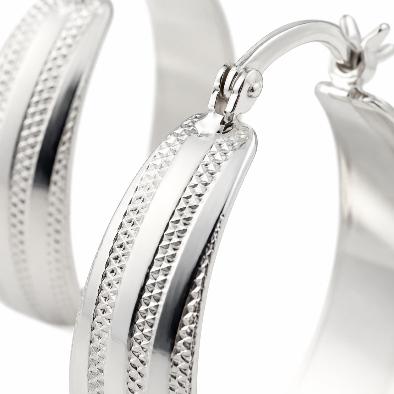 Silver Wide Band Textured Hoop Earrings — Close-up detail