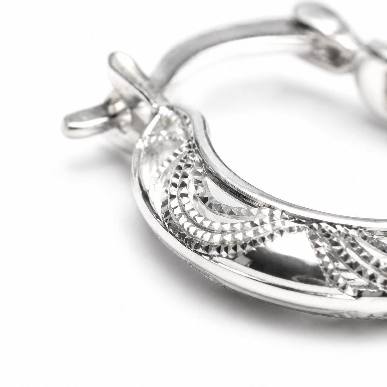 Silver Tribal Engraved Medium Hoop Earrings — Close-up detail